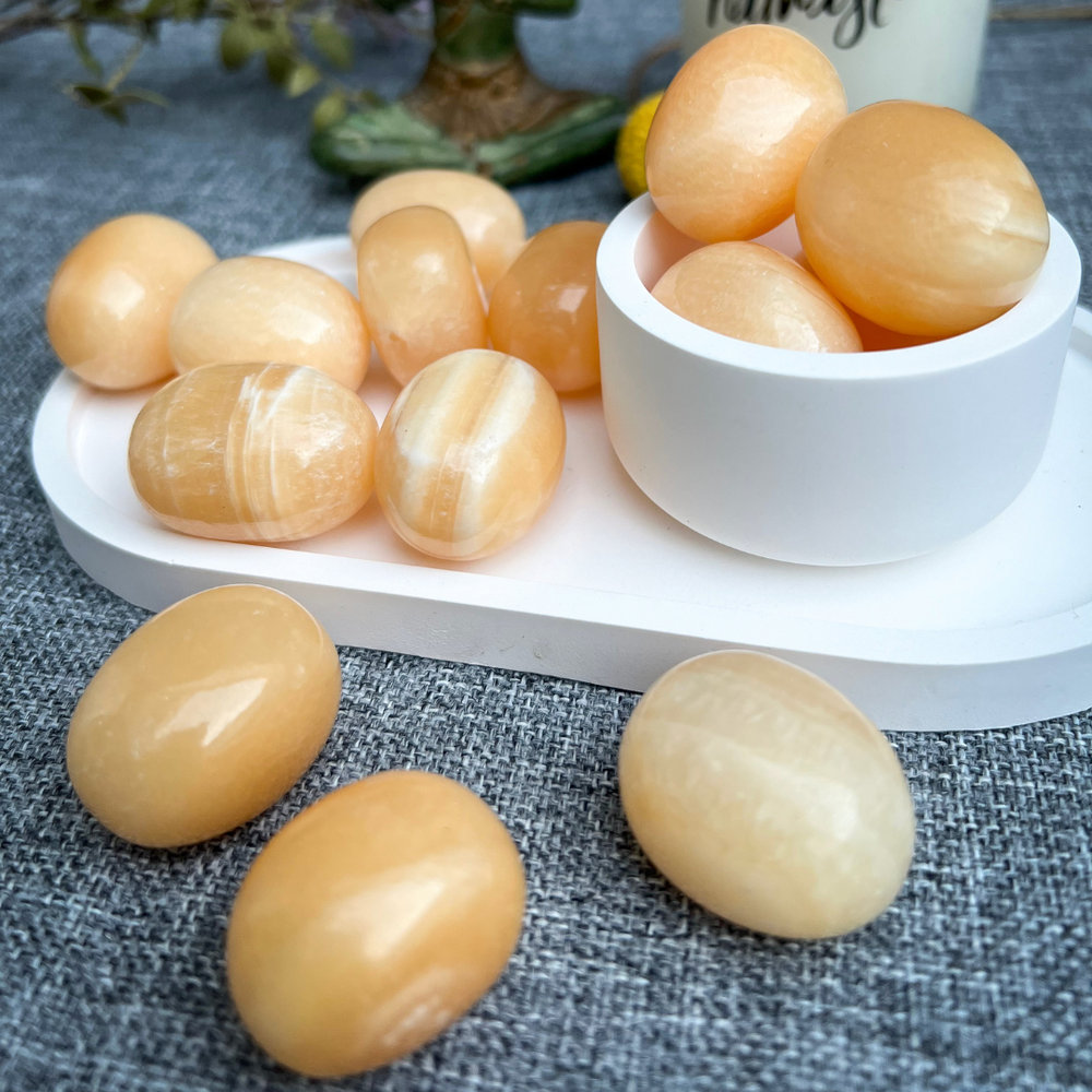 Mango Calcit Trommelstein