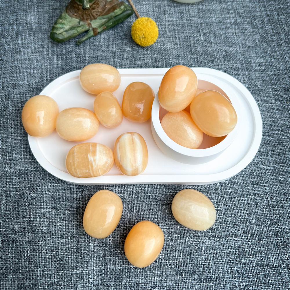 Mango Calcit Trommelstein