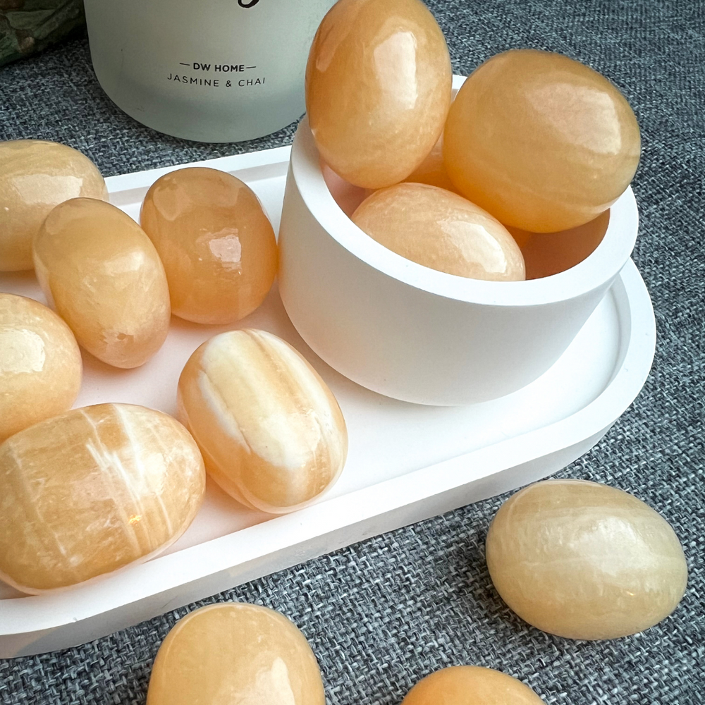 Mango Calcit Trommelstein